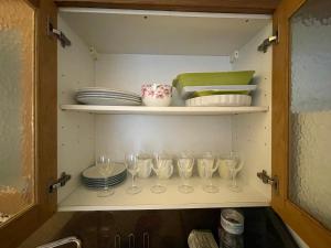 Kuchyň nebo kuchyňský kout v ubytování Appartements Charles De Gaulle