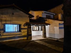 a view of a house at night at LA CASA de la ALEM 1 in La Rioja +4 photos
