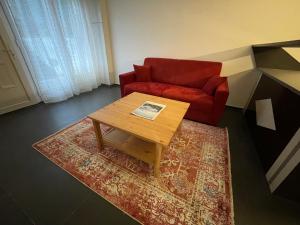 Posezení v ubytování Appartements Charles De Gaulle