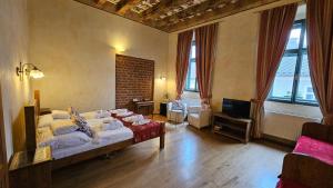 Postel nebo postele na pokoji v ubytování Hotel Opat