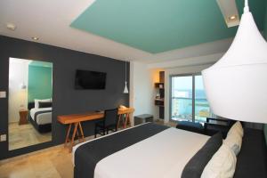 Voodi või voodid majutusasutuse Rivoli Select Hotel toas