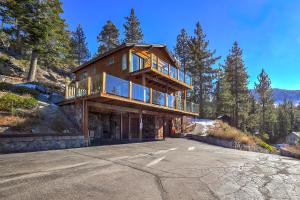 a large wooden house on top of a mountain at Tallac View in Stateline