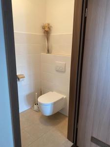 Et badeværelse på Business Apartment