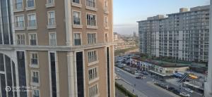 a view of a city with buildings and a street at ميدوكليه بشاك شهير in Basaksehir