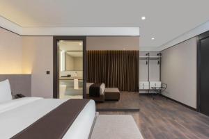 DDK Collection Hotel客房内的一张或多张床位