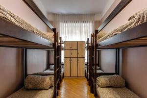 Postel nebo postele na pokoji v ubytování Centrum Hostel