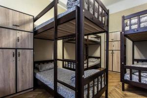 Postel nebo postele na pokoji v ubytování Centrum Hostel