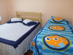Cama ou camas em um quarto em Memórias de vó mais 26 fotos