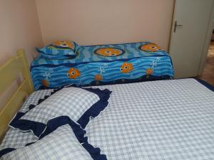 Cama ou camas em um quarto em Memórias de vó