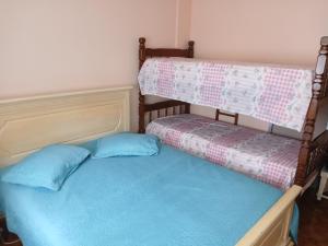 Cama ou camas em um quarto em Memórias de vó