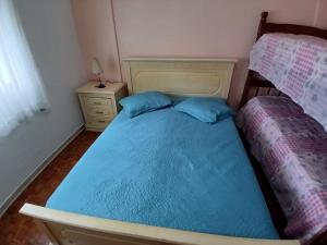 Cama ou camas em um quarto em Memórias de vó