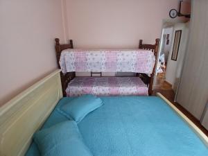 Cama ou camas em um quarto em Memórias de vó