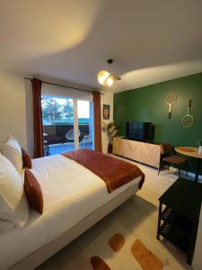 En eller flere senge i et værelse på Studio Tennis et Padel + 28 billeder