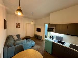 Kuchyň nebo kuchyňský kout v ubytování Pearl Bee Deluxe Suites
