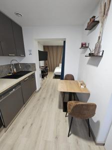 Η κουζίνα ή μικρή κουζίνα στο Appartement Type 1 avec parking +7 φωτογραφίες