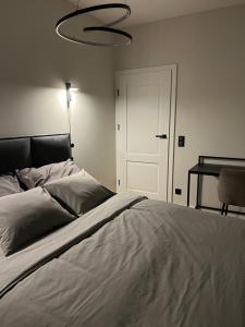 Postel nebo postele na pokoji v ubytování Apartament NP