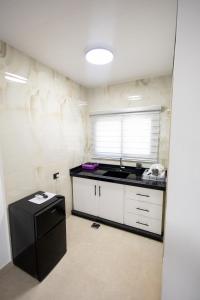 Η κουζίνα ή μικρή κουζίνα στο The yard