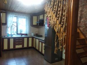 Кухня или мини-кухня в Cottage Spadok
 +17 фотографий