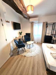 Ένα ή περισσότερα κρεβάτια σε δωμάτιο στο G5 Appartement Climatisé Centre Angouleme