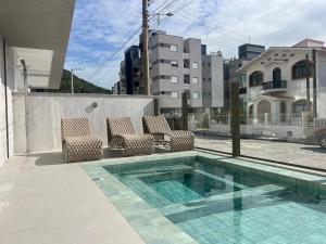 Bazén v ubytování Piscina no condominio! Apto em Palmas! OJ04I nebo v jeho okolí