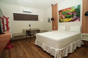 Postel nebo postele na pokoji v ubytování W4 Hotel