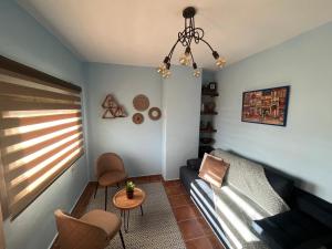 Posezení v ubytování Ιξός Home