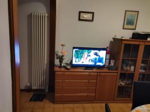 TV a/nebo společenská místnost v ubytování Camera matrimoniale