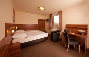 
Ein Bett oder Betten in einem Zimmer der Unterkunft Astay Hotel
