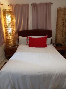 Postel nebo postele na pokoji v ubytování Hotel El Tronco Inc + 37 fotografií