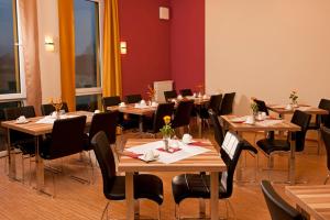 
Ein Restaurant oder anderes Speiselokal in der Unterkunft Astay Hotel 
