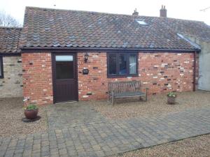 A porch or other outdoor area at The Courtyard, Laurel Farm 