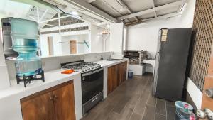 Η κουζίνα ή μικρή κουζίνα στο Villas Mariela