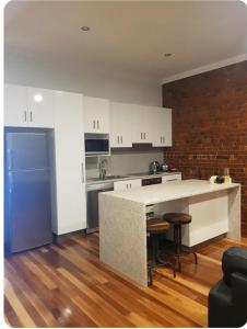 Kuchyň nebo kuchyňský kout v ubytování Sublime spa apartments