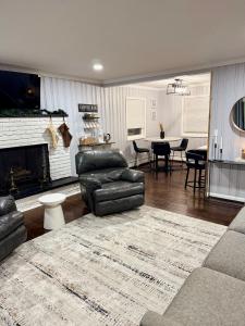 a living room with a couch and a fireplace at Vernon Cozy 2BD Pet-Friendly Mountain Creek in Vernon