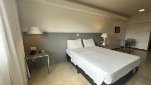 Postel nebo postele na pokoji v ubytování Loft 3 Edf Celita Franca Business e flat