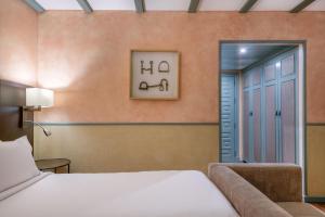 Postel nebo postele na pokoji v ubytování AC Hotel Ciudad de Toledo by Marriott