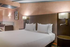 Postel nebo postele na pokoji v ubytování AC Hotel Ciudad de Toledo by Marriott