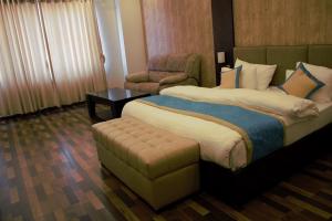 Postel nebo postele na pokoji v ubytování Hotel Tulip Pvt Ltd