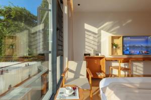Balkon oz. terasa v nastanitvi Phoenix Ancient City Courtyard Hotel凤凰古城庭院酒店