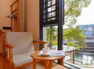Balkon oz. terasa v nastanitvi Phoenix Ancient City Courtyard Hotel凤凰古城庭院酒店