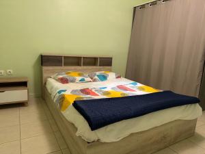 Una cama o camas en una habitación de KaZ-a-RoRo