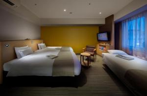 Postel nebo postele na pokoji v ubytování Hotel Villa Fontaine Tokyo-Kayabacho