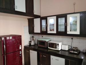 O bucătărie sau chicinetă la One bhk Villa Home stay