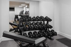 a rack of dumbbells in a gym at Bournemouth Highcliff Marriott Hotel in Bournemouth