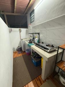 Kuchyň nebo kuchyňský kout v ubytování Aaira Guest House Melaka