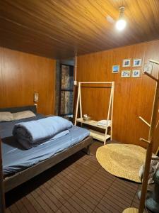 Ένα ή περισσότερα κρεβάτια σε δωμάτιο στο Manglinerida