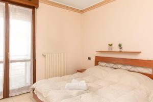 Postel nebo postele na pokoji v ubytování Ganden's Flat