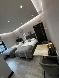 Postel nebo postele na pokoji v ubytování Park Avenue Hotel