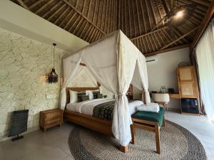 Letto o letti in una camera di ARYA Sumba Resort - Kodi