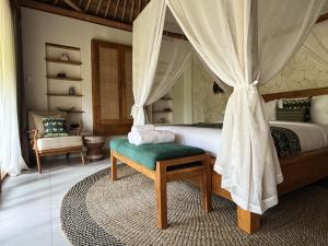 Letto o letti in una camera di ARYA Sumba Resort - Kodi